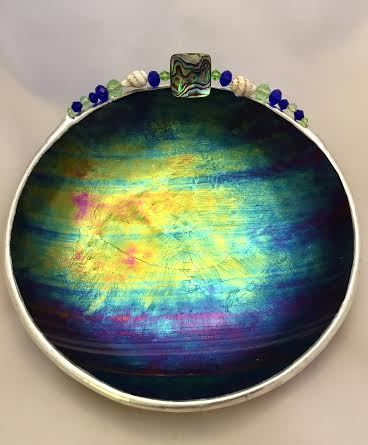 A bowl with a colorful design on it